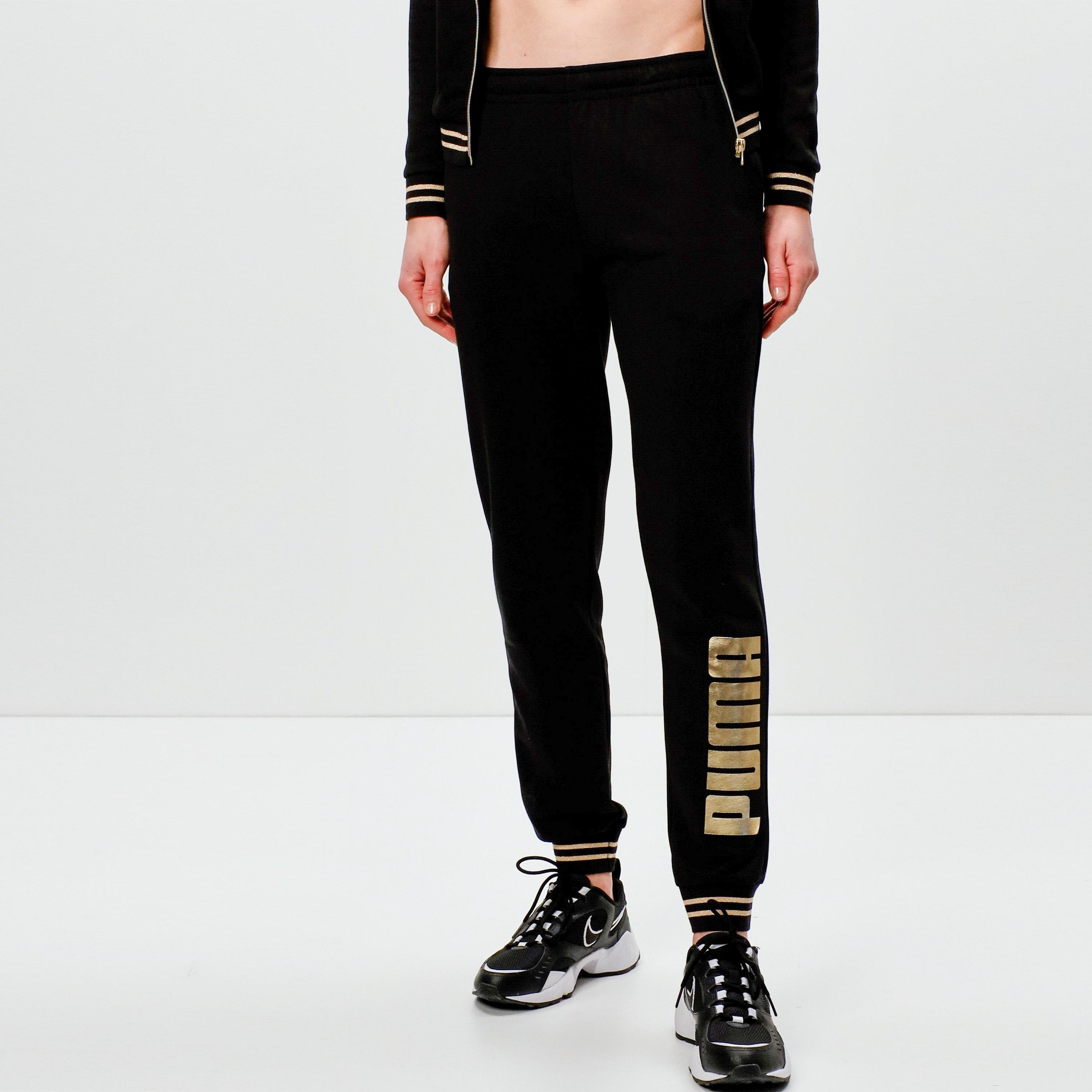 PUMA Gold Metallic Trainingsanzug Damen black im Online Shop von SportScheck kaufen