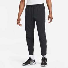 Rückansicht von Nike Unlimited Trainingshose Herren black-black-reflective silv