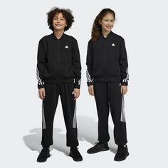Rückansicht von adidas Future Icons 3-Streifen Trainingsanzug Trainingsanzug Kinder Black / White