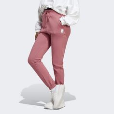 Rückansicht von adidas Lounge Fleece Hose Trainingshose Damen Pink Strata