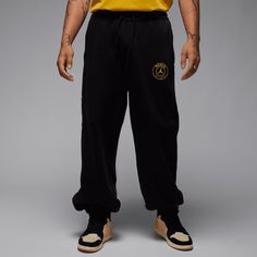 Nike Paris St.-Germain Fleece Trainingshose Herren schwarz / gelb