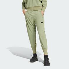 Rückansicht von adidas Z.N.E. Woven Hose Trainingshose Damen Tent Green