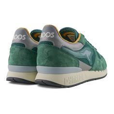 Rückansicht von KangaROOS Originals COIL R1 TECH Sneaker Immergrün/Senfgelb