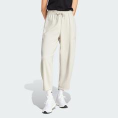 Rückansicht von adidas Essentials Contemporary Logo Barrel Hose Trainingshose Damen Beige