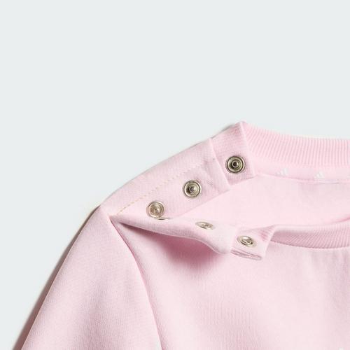 Rückansicht von adidas Essentials Kids Jogginganzug Trainingsanzug Kinder Clear Pink / White