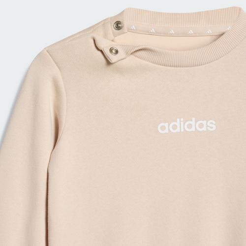 Rückansicht von adidas Essentials Kids Jogginganzug Trainingsanzug Kinder Crystal Linen / White