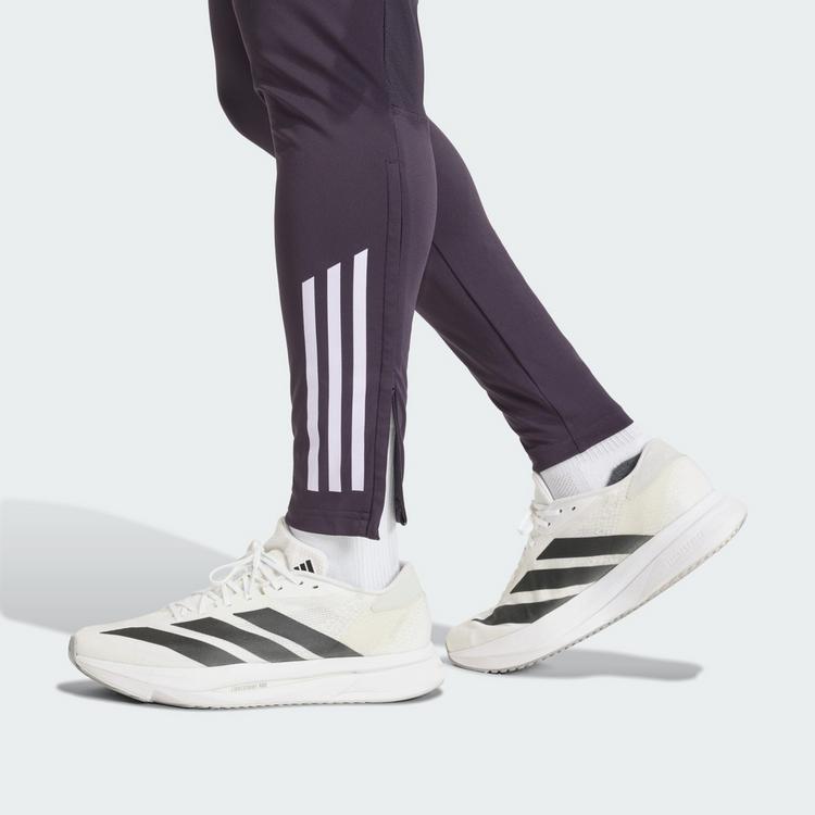 adidas adidas Manchester United Tiro 25 Competition Trainingshose Herren - Aurora Black / Purple Tint - 1 | SportScheck