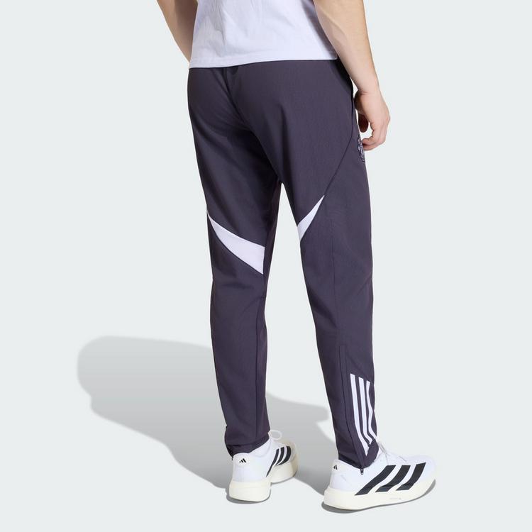 adidas adidas Manchester United Tiro 25 Competition Trainingshose Herren - Aurora Black / Purple Tint - 1 | SportScheck