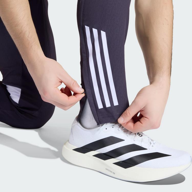 adidas adidas Manchester United Tiro 25 Competition Trainingshose Herren - Aurora Black / Purple Tint - 1 | SportScheck