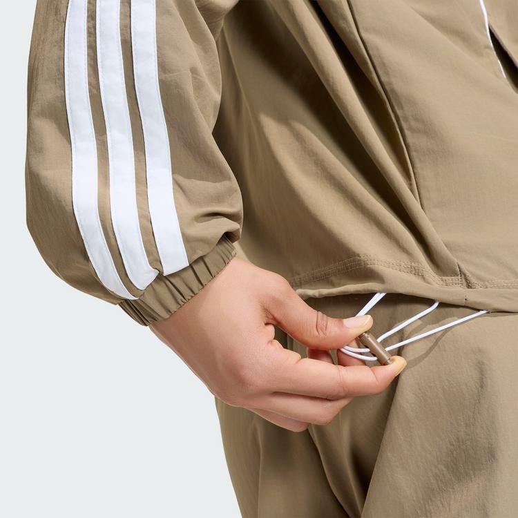 adidas adidas Iconic Trainingsjacke, gewebt, Trainingsanzug Damen - Khaki Six - 1 | SportScheck