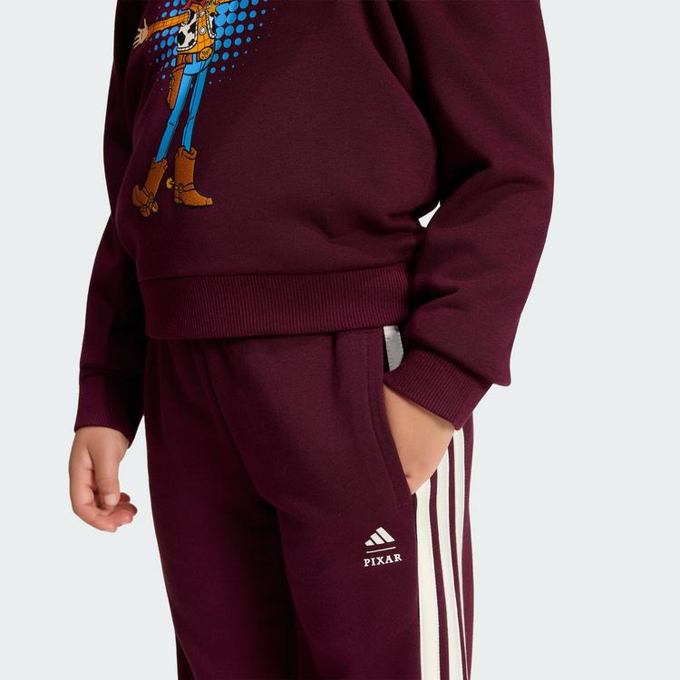 adidas adidas ADIDAS PIXAR TOY STORY JOGGINGANZUG Trainingsanzug Kinder - Maroon / Off White - 1 | SportScheck