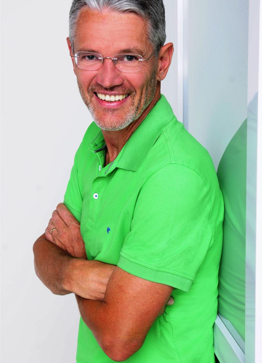 Bild des Laufcoachs Harry Hüttmann im grünen Poloshirt