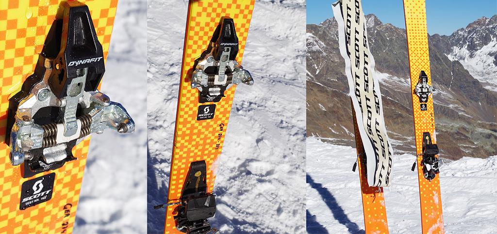 Dynafit Tourenbindungen in der Nahaufnahme an Skiern montiert, die im Schnee stecken.