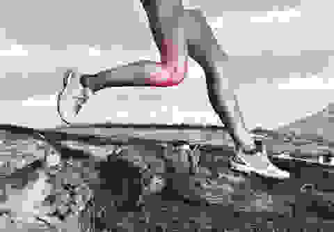 Eine grafische Darstellung von hoher Belastung des Kniegelenks beim Trailrunning.